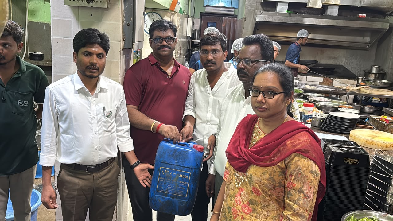 Gnapika Enterprises team collecting used cooking oil